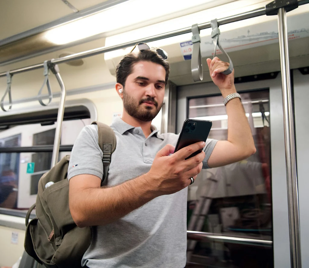 traveler using metro for cheap transportation